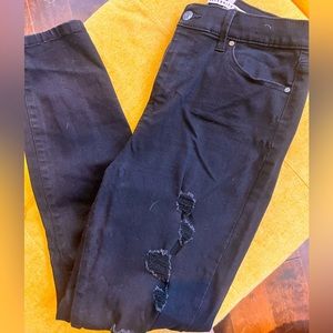 Black jeans with fraying
